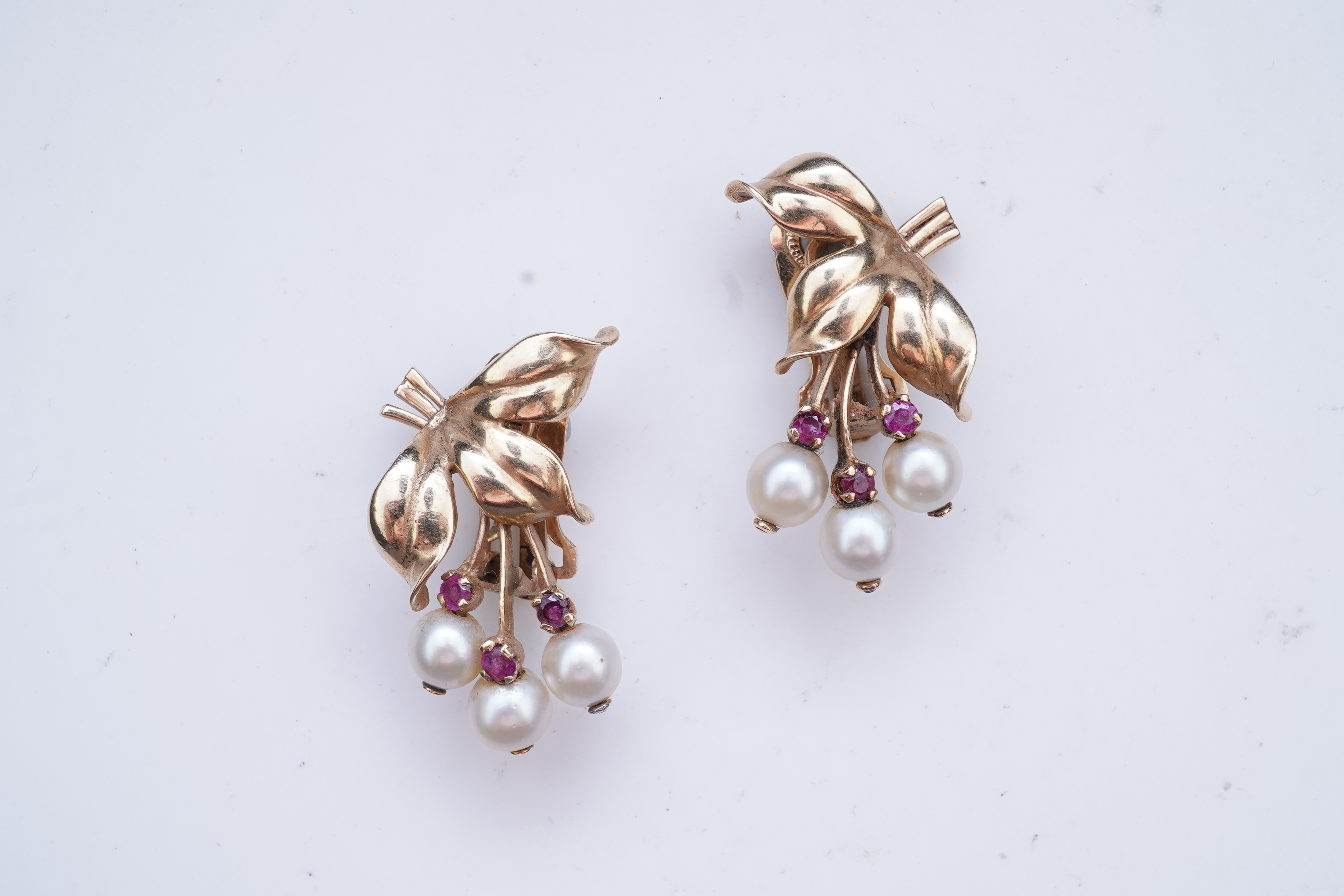 A pair of Retro cultured pearl and ruby ear clips, 1940s